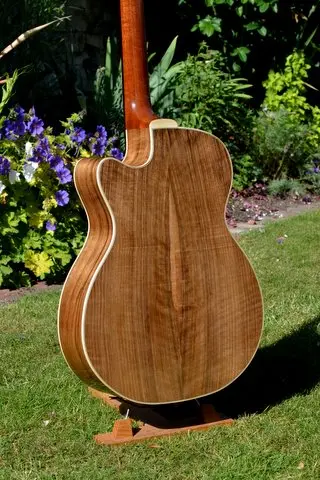 Walnut used to make a custom guitar. We buy Walnut for musical instruments.